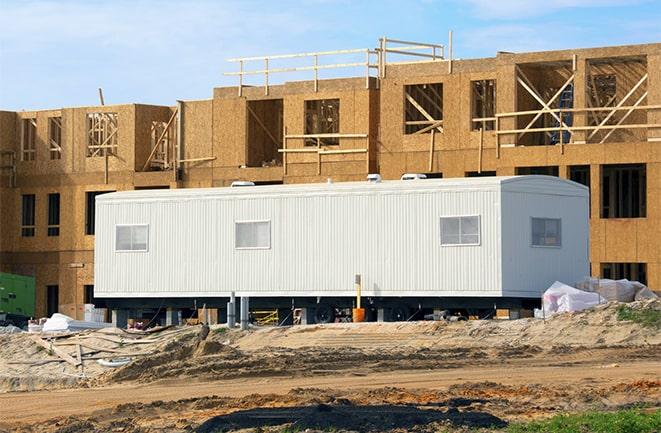 construction office rentals with signage for leasing information in Bell